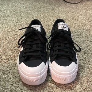 Brand new Adidas shoes. Size 8. Worn once for only a short time.